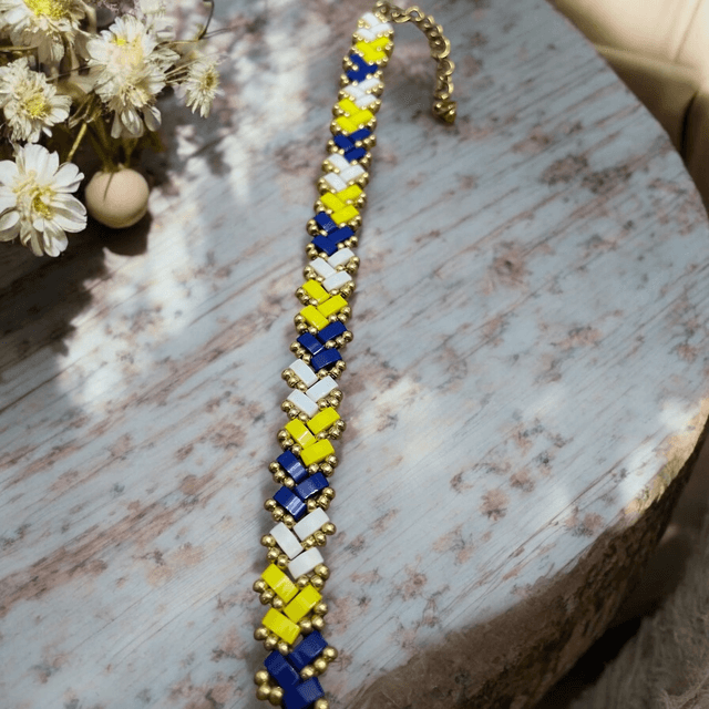 Bracelet tissé en perles Tila bleu et jaune